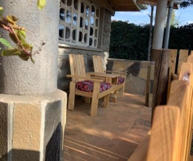 Enchanting Pallet-Themed Olugulu Cottage