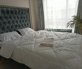 Affix Entire serviced 2 bedroom apartment with parking, restaurant supermarket laundry and liquor store