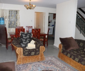 Nyayo Estate Embakasi Nairobi Kenya 3Bedroms 2Bathrooms Mansionette Own Compound next to Jomo Kenyatta intl Airport Wifi Parking max 5 people comfortable accommodation Danville Mansionete