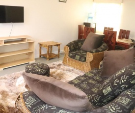 Nyayo Estate Embakasi Nairobi Kenya 3Bedroms 2Bathrooms Mansionette Own Compound next to Jomo Kenyatta intl Airport Wifi, Parking max 5 people comfortable accommodation Carovile Mansionete
