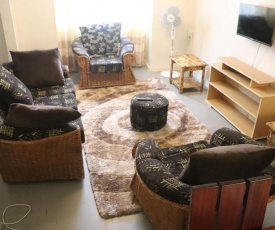 Nyayo Estate Embakasi Nairobi Kenya 3Bedroms 2Bathrooms Mansionette Own Compound next to Jomo Kenyatta intl Airport Wifi, Parking max 5 people comfortable accommodation Danville Mansionete