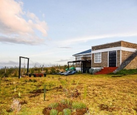 Ole Munyak-4 bed house on the hill