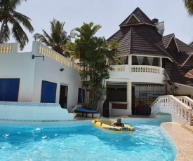 Room in Guest room - Kivuliii villa cottage we are located opposite lantana Gaul hotel
