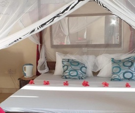 Room in Guest room - Kivuliii villa cottage we are located opposite lantana Gaul hotel