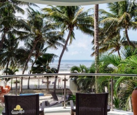 Rosy Sea Front Beach Condo