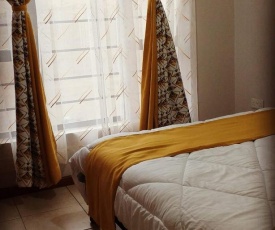 Susan's cozy studio apartment near JKIA