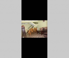 Cheerful 3-bedroom residential home with free parking premises