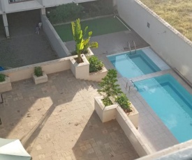 Dolly luxury stay is a furnished 2bedroom Apartment situated in Ongata rongai,200m off Magadi road and 20mins from Galleria mall. It provides world-Class amenities and services, Maximizing the quality of your stay in a tranquil and upmarket environme